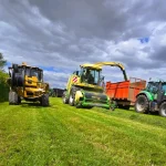Wessex-Internet-mole-plough-alongside-harvester-in-field